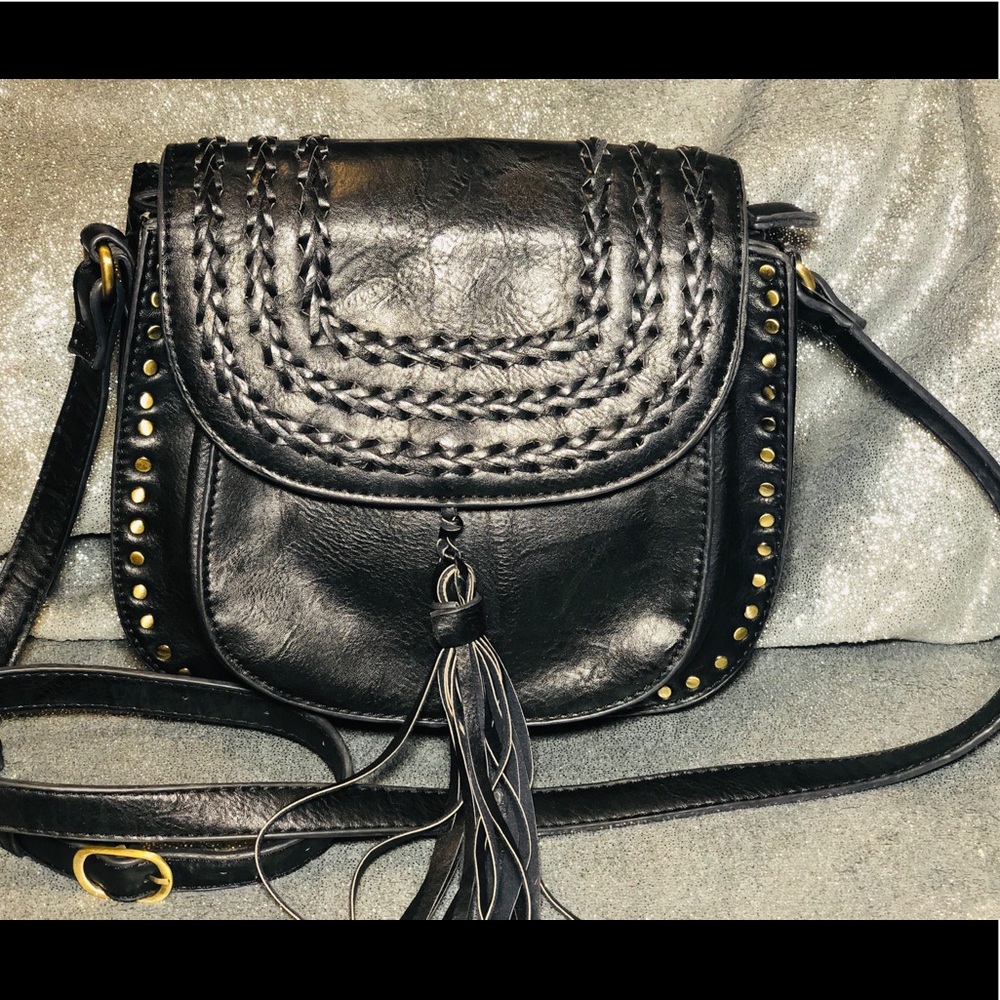 Gorgeous, Antik Kraft whipstitch saddle bag.